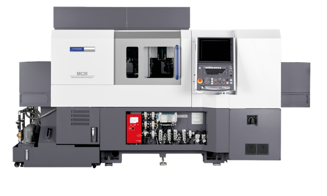 Eine graue und weiße Industriemaschine mit Monitor und offenem Technikbereich